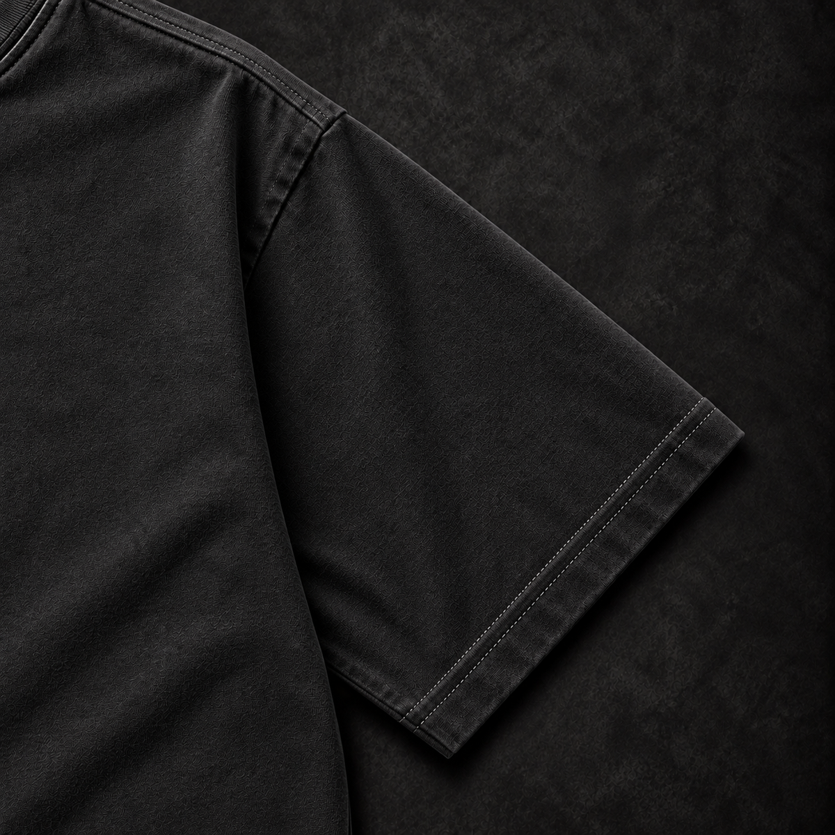 Black Manai Falls tee sleeve and stitching detail