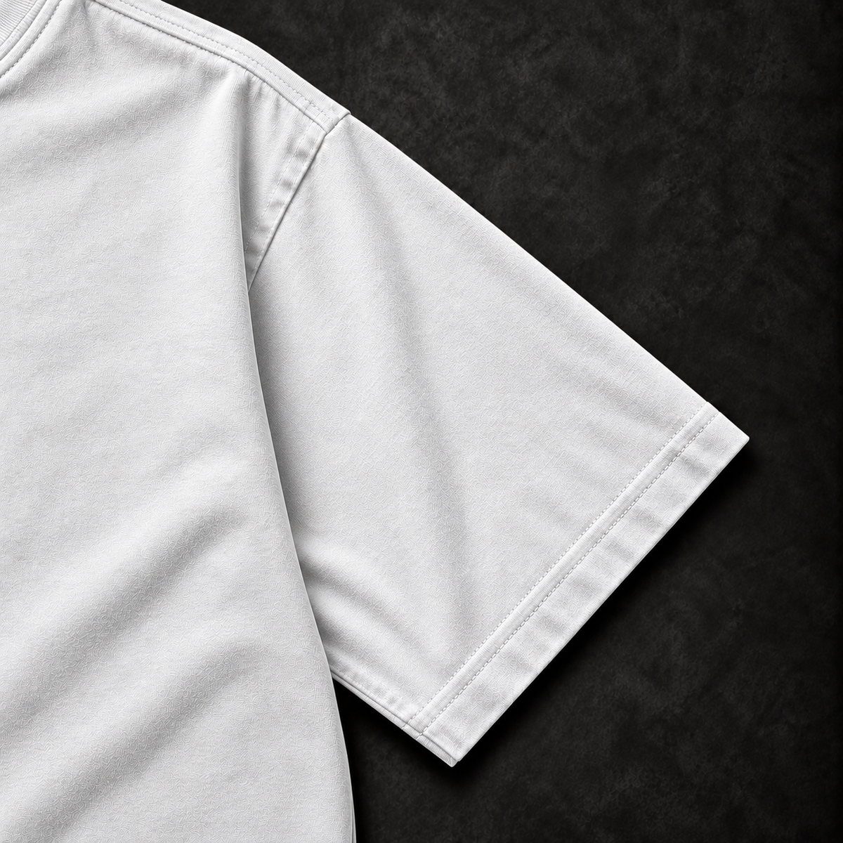 White Manai Falls tee sleeve and stitching detail