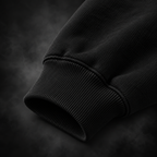Close-up of the ribbed cuff and fabric on the Yonakasaku black hoodie