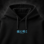 Close-up of the electric blue Japanese front print on the Yonakasaku black hoodie